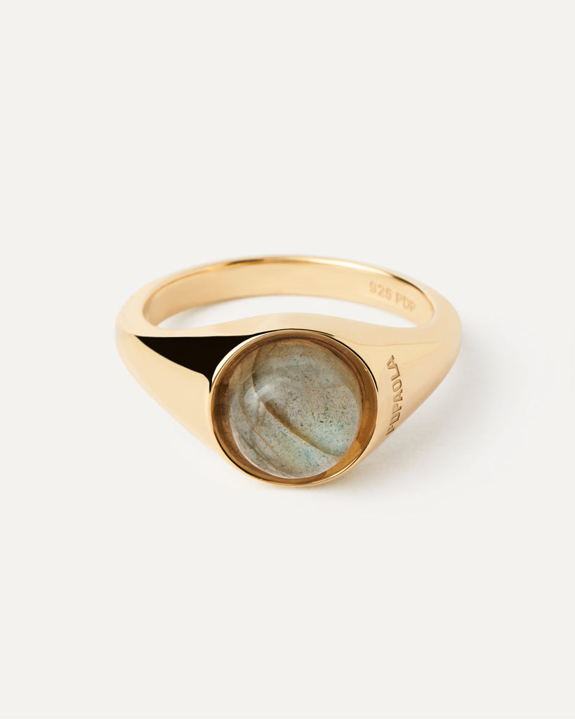 Gold plated half sphere ring topped with an oval grey gemstone