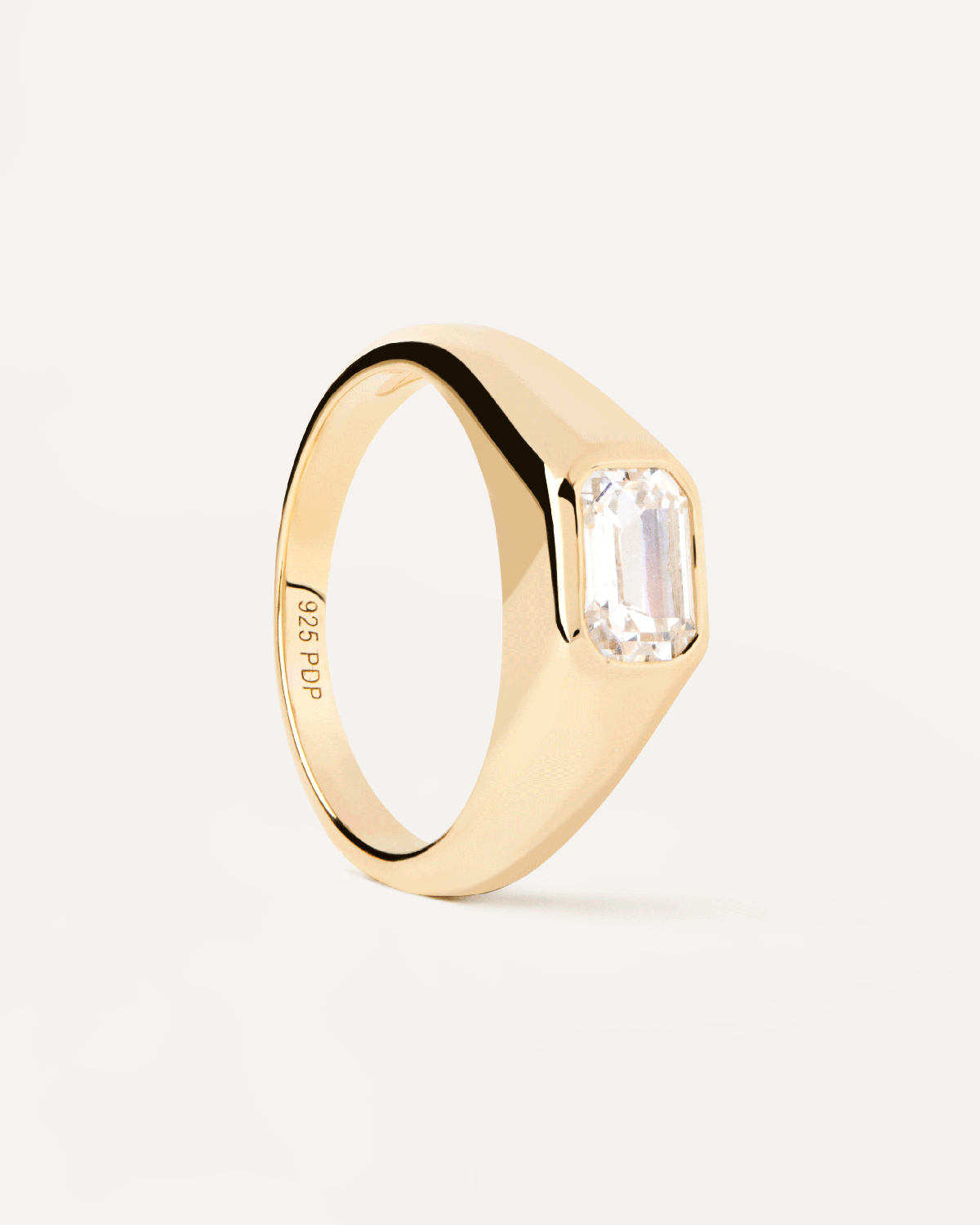 Gold plated silver statement ring with rectangular white zirconia