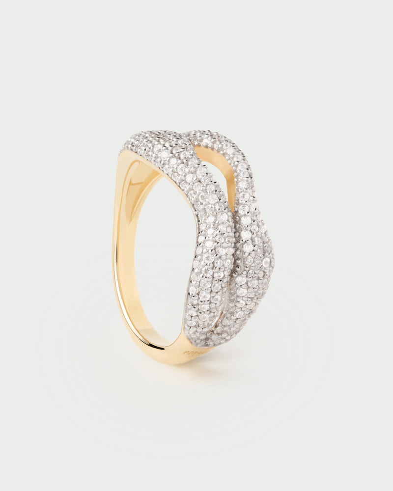 Anillo elegante de dos bandas engastado con pavé de circonitas y líneas fluidas