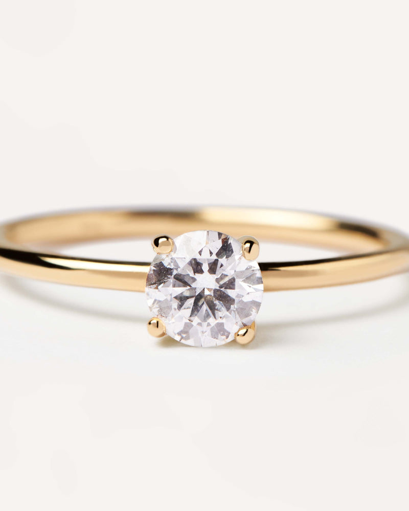 Solid yellow gold solitary engagement ring set with a great 0.50 carat lab-grown diamond