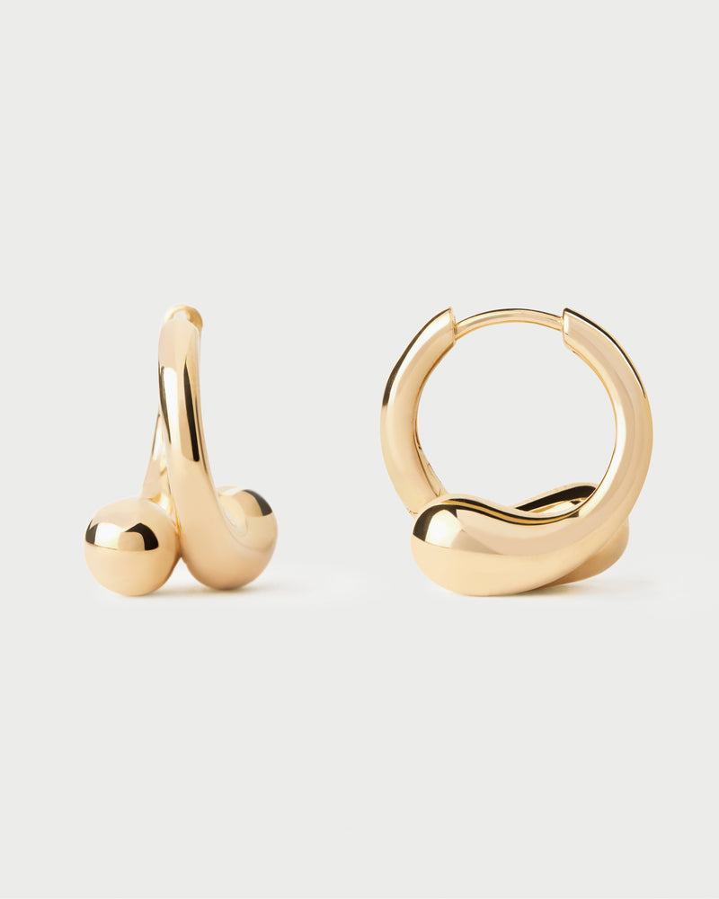 Modern huggie earrings with asymmetric design featuring two overlapping drop-shaped motifs