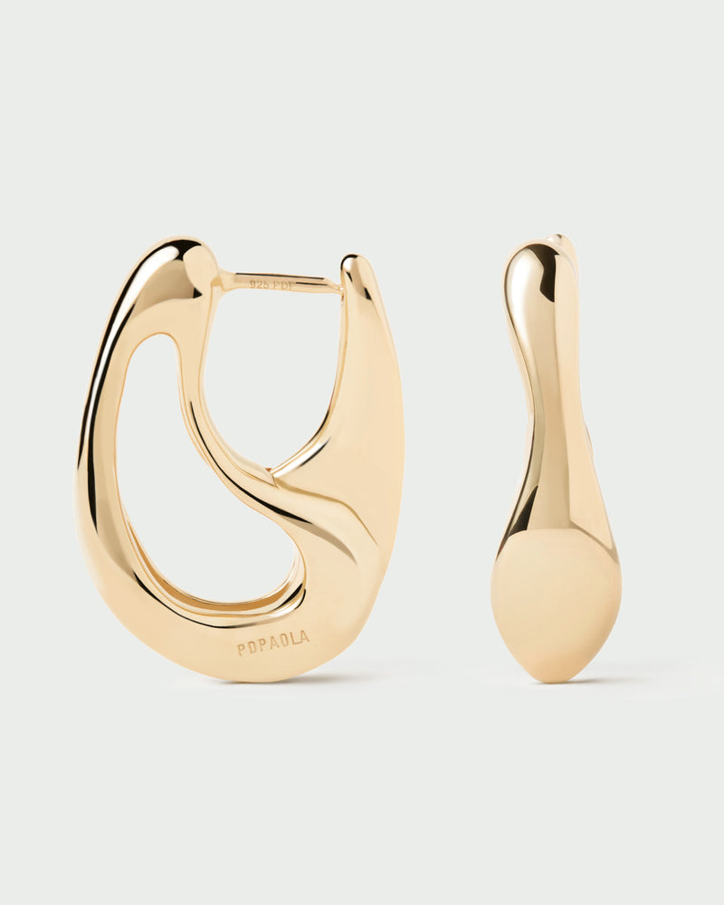 Gold-plated sculptural hoop earrings with a wavy drop shape