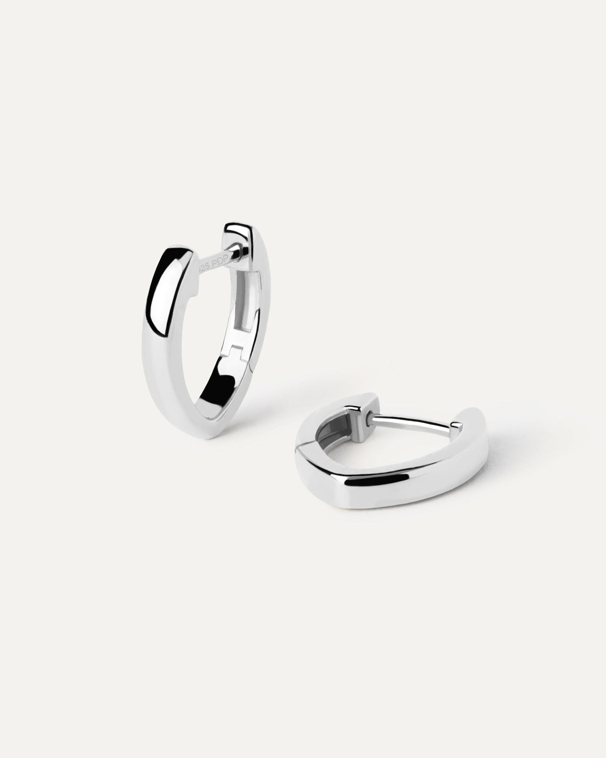 Sterling silver oval shape huggies with a hinged opening | Duke Silver ...