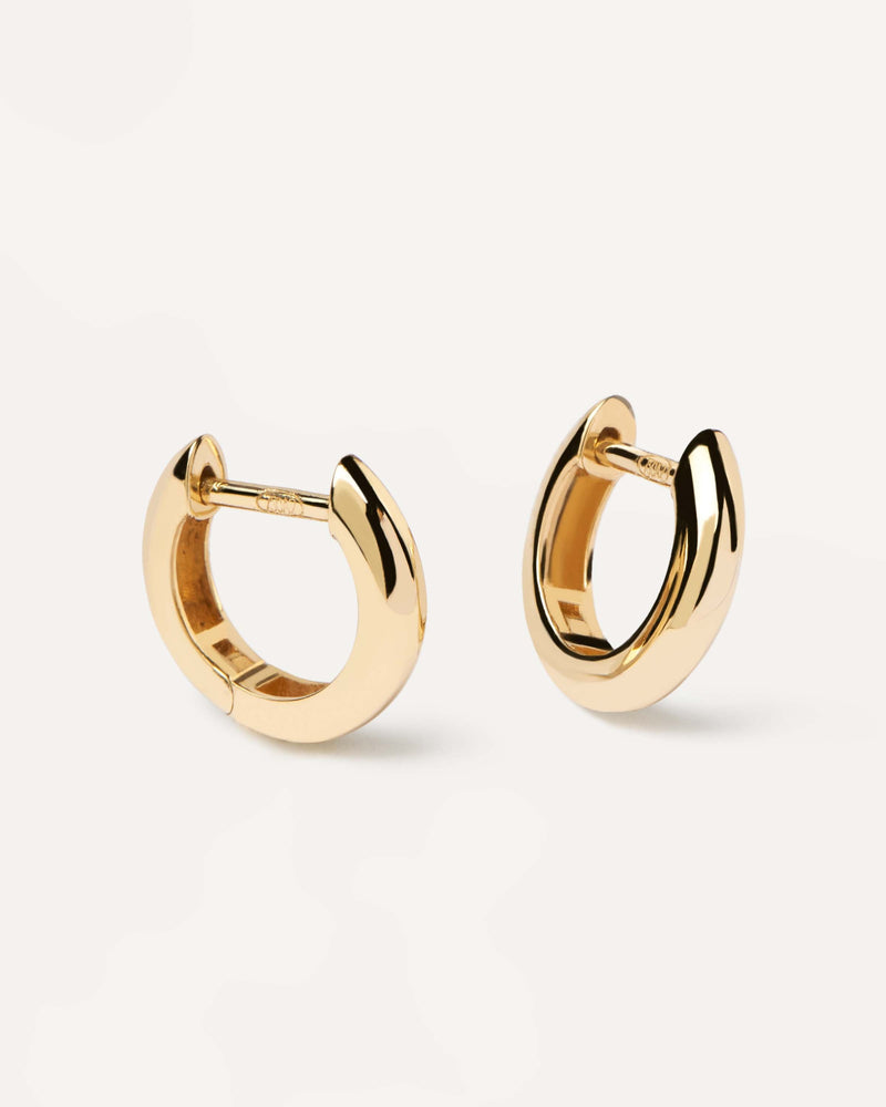 Plain solid yellow gold small hoops made of recycled gold