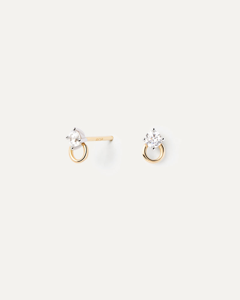 Gold earrings with a round 0.1 carat lab-grown diamond each and a gold circle