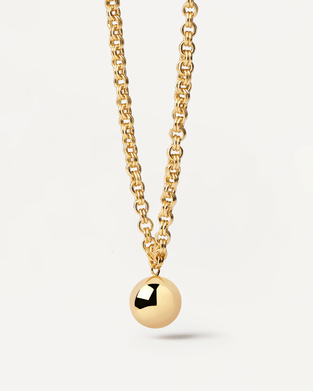 Gold-plated silver chain necklace with a hanging ball pendant 