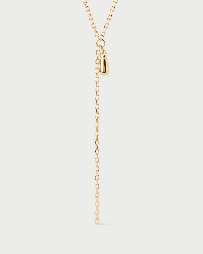 Y chain ecklace featuring a drop and a long chain pendant