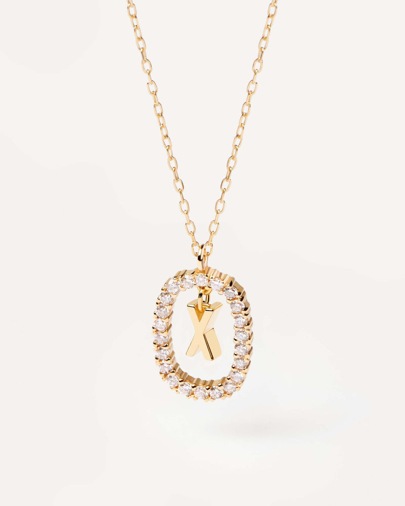 Initial X necklace in solid yellow gold, circled by 0.33 carats lab-grown diamonds