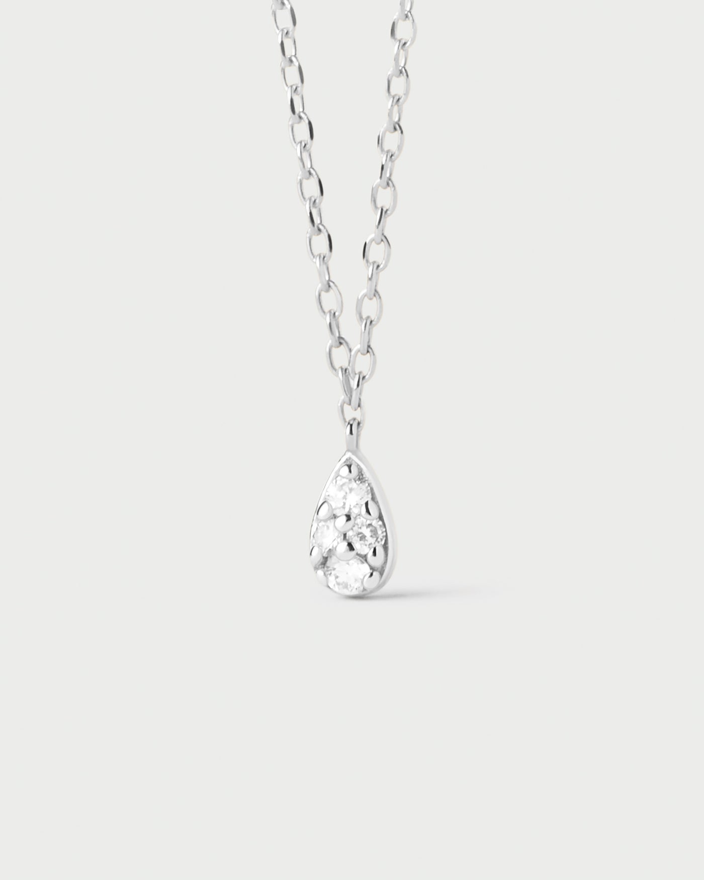 Diamonds and white gold Rio solitary necklace. 18K white gold minimal solitary chain necklace with a pavé lab-grown diamond drop pendant. Get the latest arrival from PDPAOLA. Place your order safely and get this Best Seller.