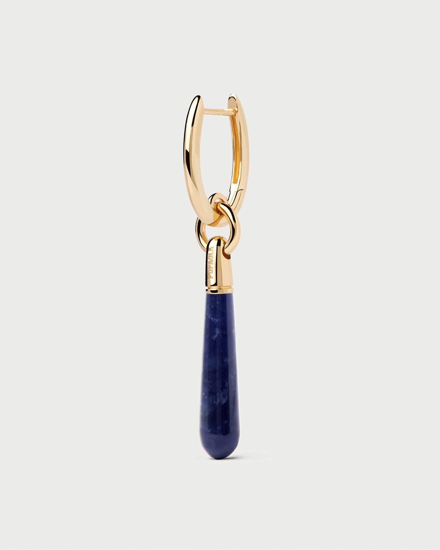 Sodalite large Jupiter single hoop. Gold-plated single hoop with a royal blue gemstone drop pendant. Get the latest arrival from PDPAOLA. Place your order safely and get this Best Seller.