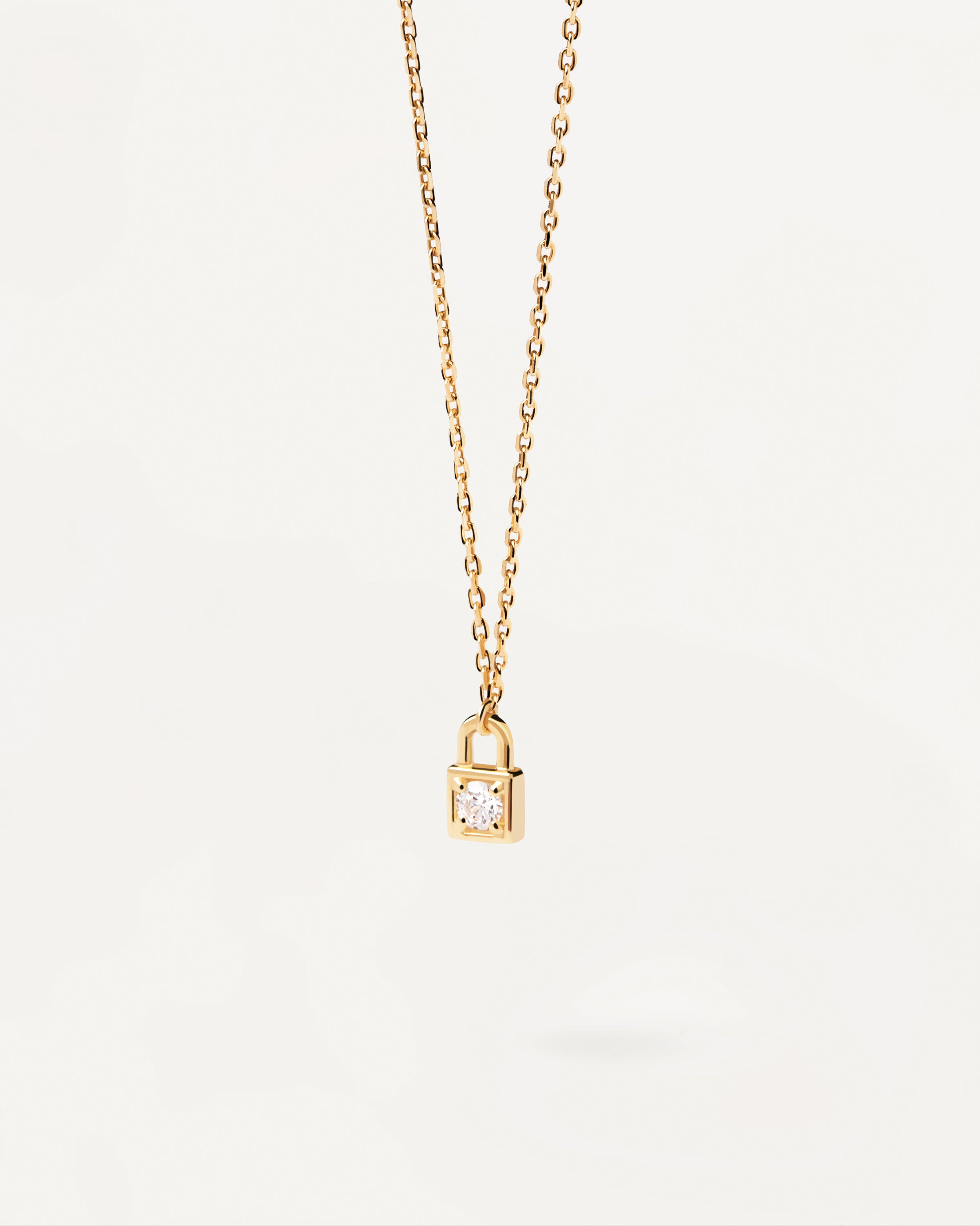 Gold chain necklace store with padlock