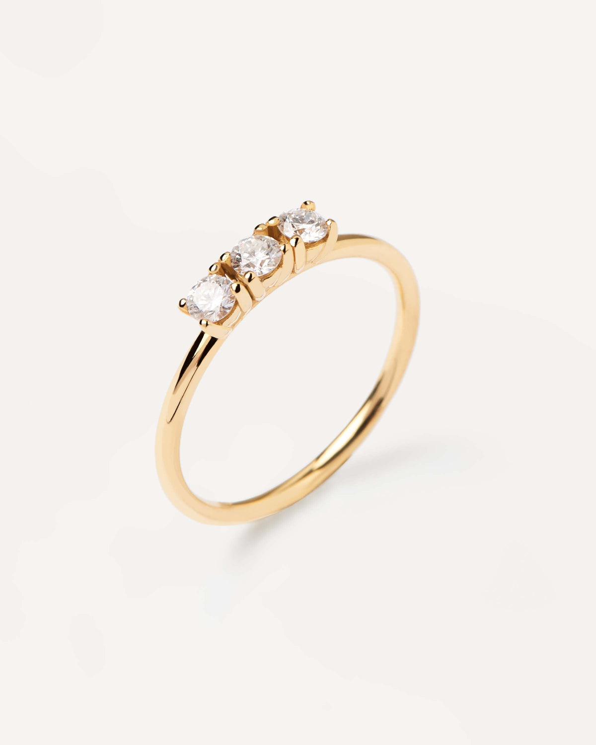 Solid yellow gold ring with three lab-grown diamonds in rounded cut ...