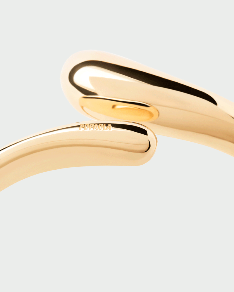 Brazalete Orbit - 
  
    Plata de Ley / Baño de Oro 18K
  
