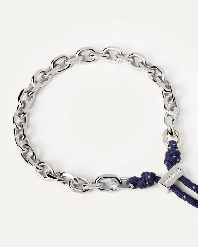 Silver tone chain bracelet with a navy blue rope adjustable sliding ...