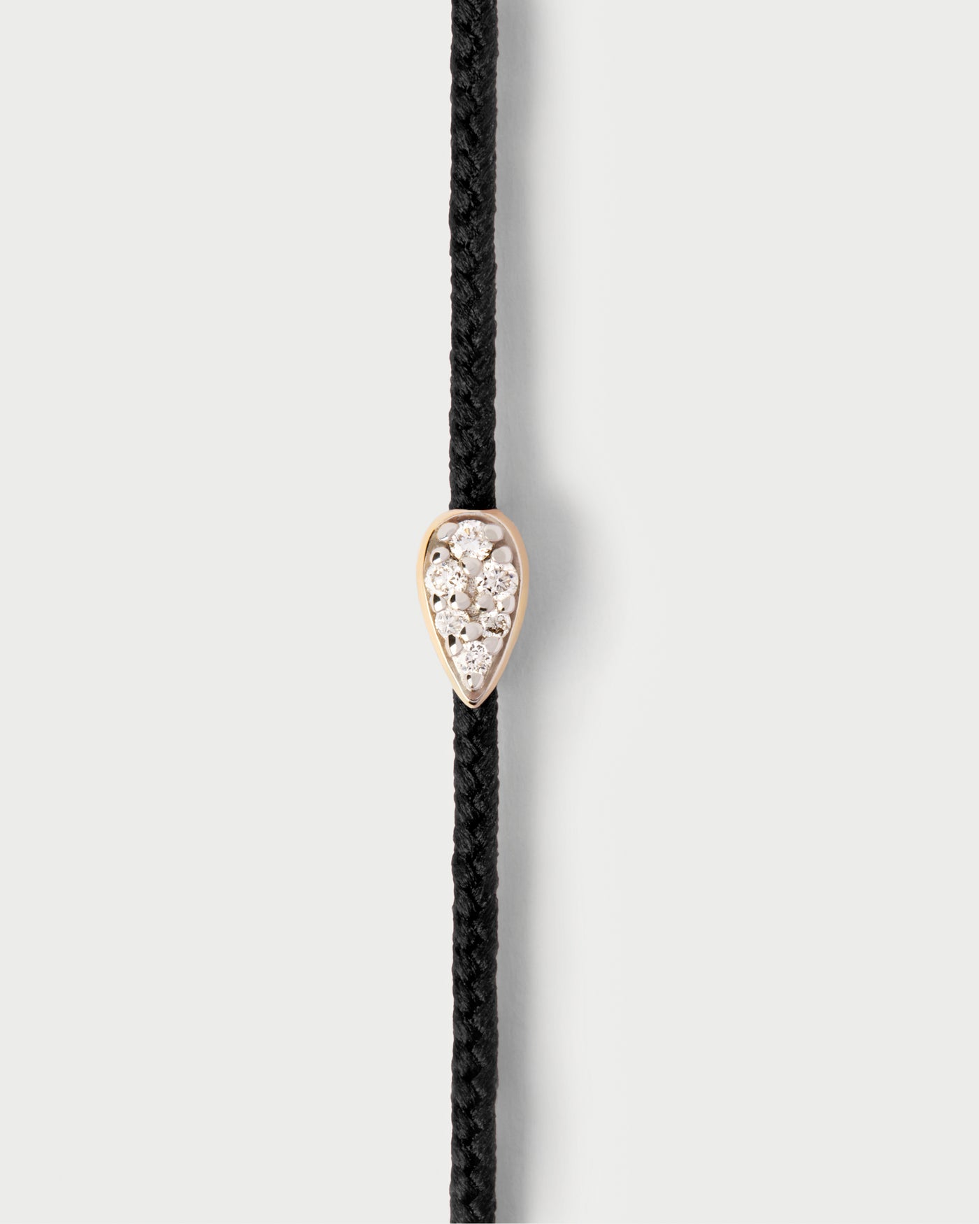 Isa Diamond cord bracelet. Adjustable diamond cord bracelet featuring a drop set with pavé lab-grown diamonds. Get the latest arrival from PDPAOLA. Place your order safely and get this Best Seller.