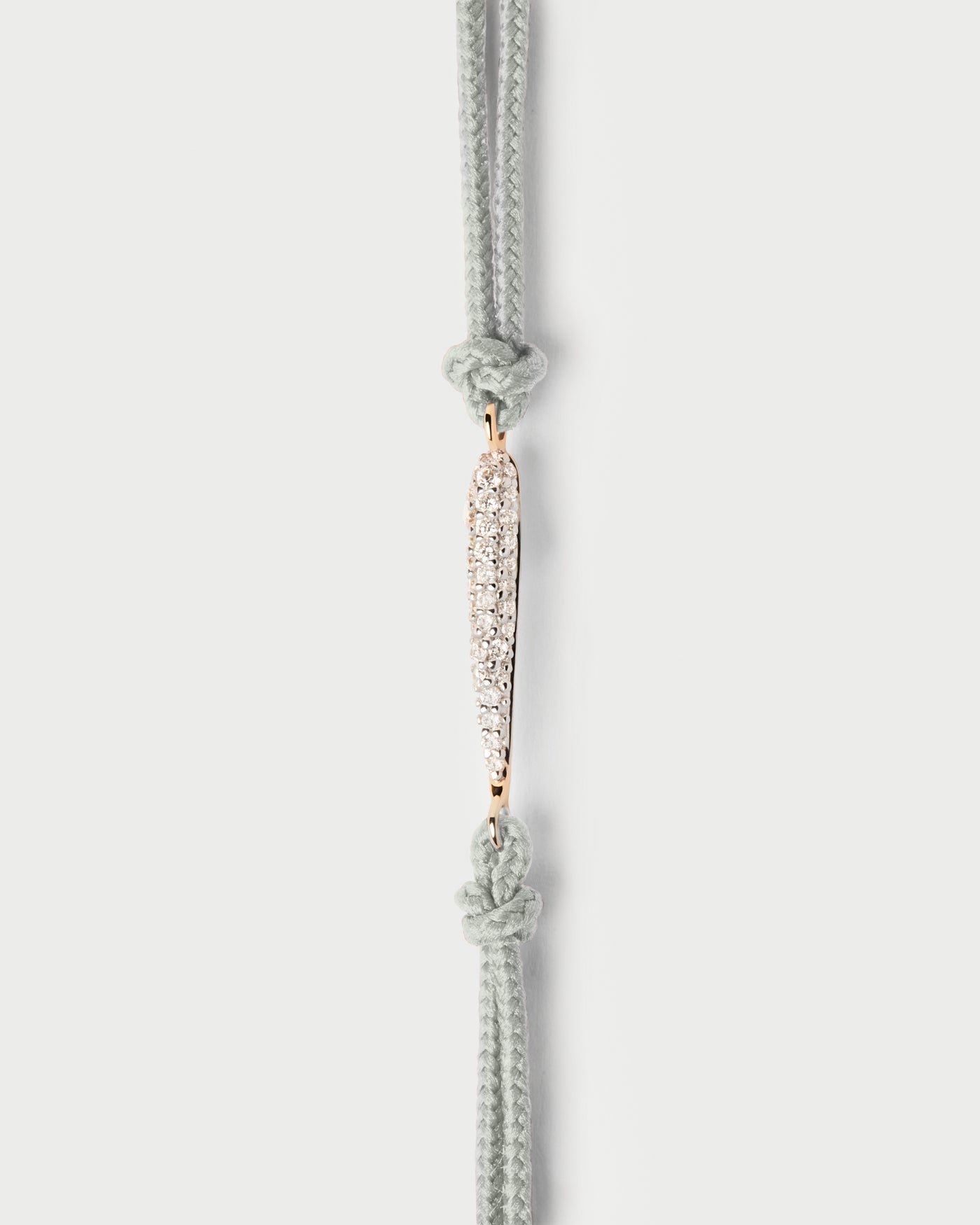 Nina Diamond cord bracelet. Adjustable diamond cord bracelet featuring an oval pavé lab-grown diamond motif. Get the latest arrival from PDPAOLA. Place your order safely and get this Best Seller.