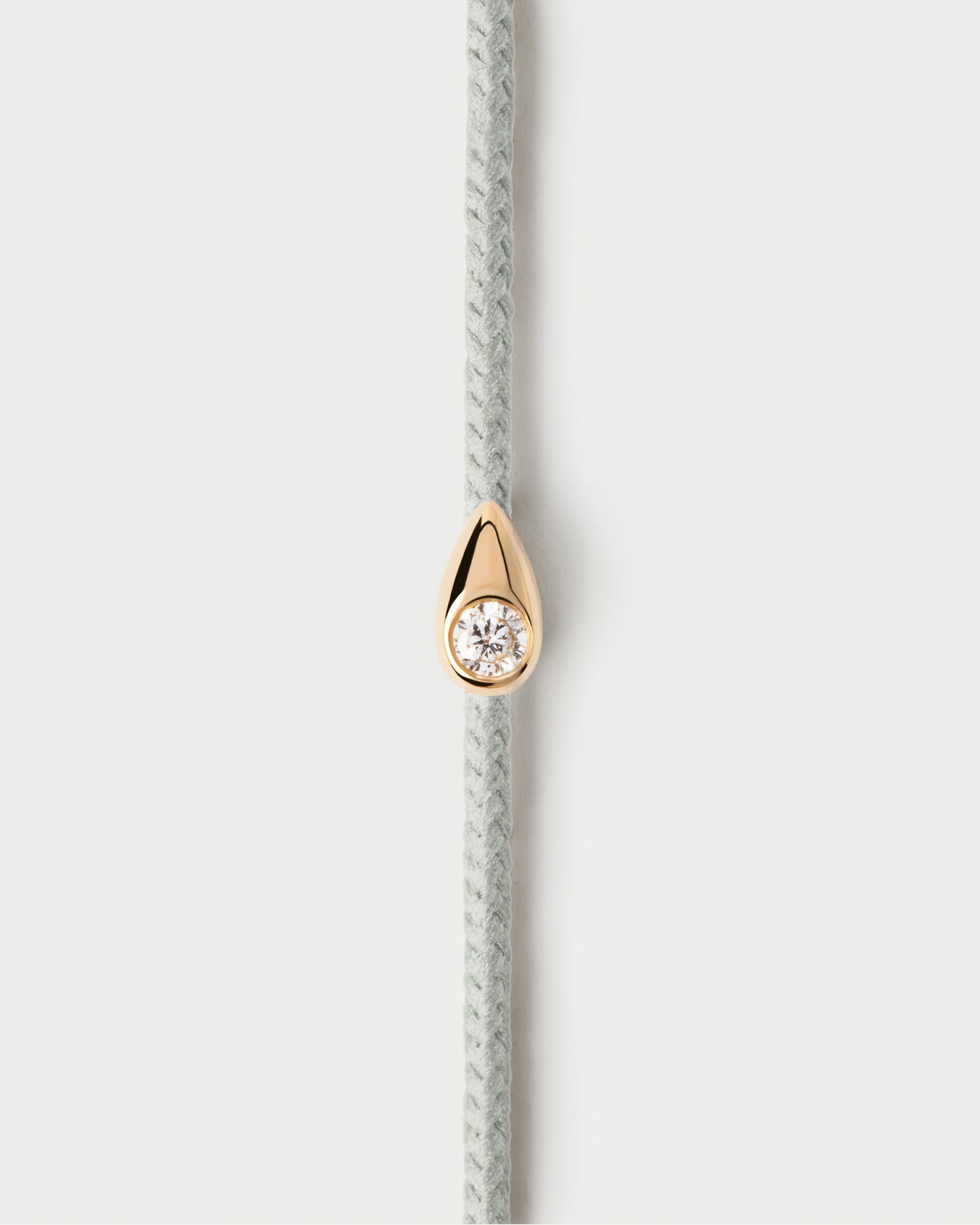 Lia Diamond cord bracelet. Adjustable diamond cord bracelet featuring a drop flush set with a lab-grown diamond. Get the latest arrival from PDPAOLA. Place your order safely and get this Best Seller.