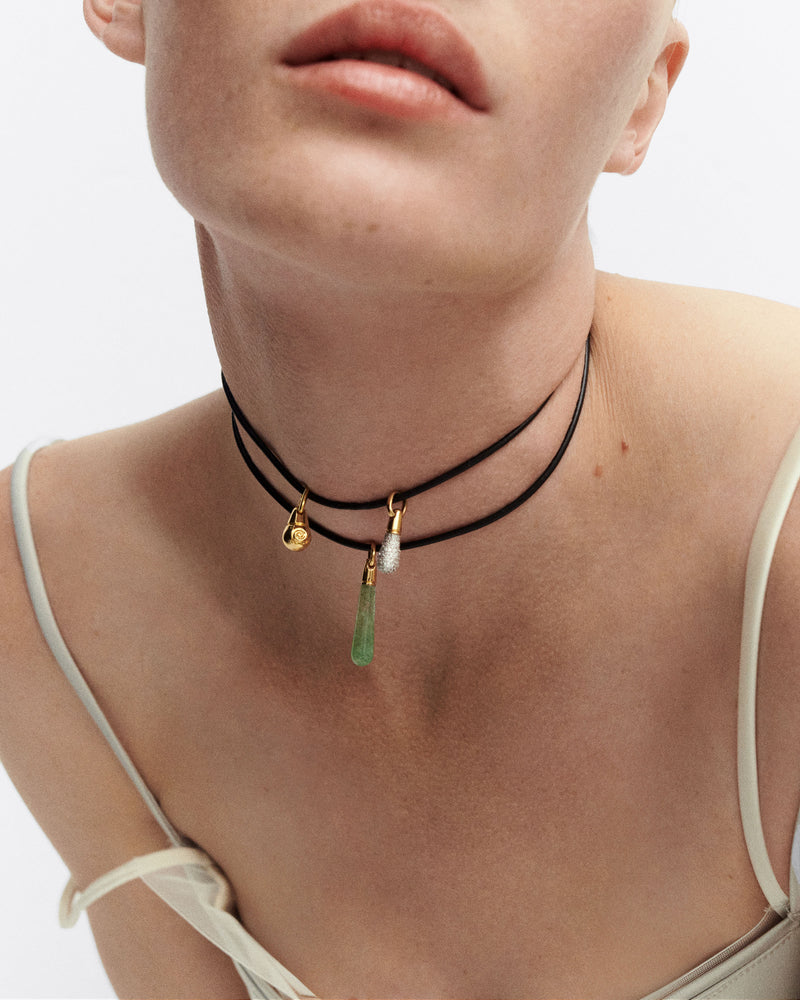 Dana leather bow necklace - 
  
    Leather / 18K Gold plating
  
