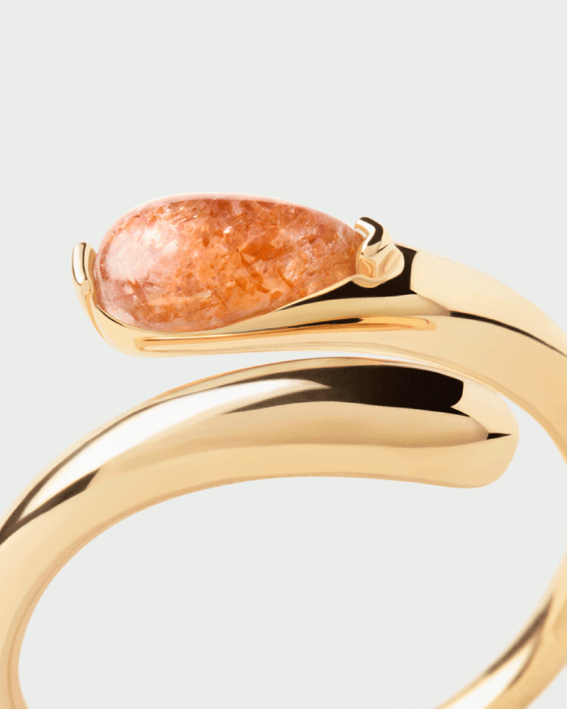 Gold-plated fluid open ring embellished with an orange oval gemstone