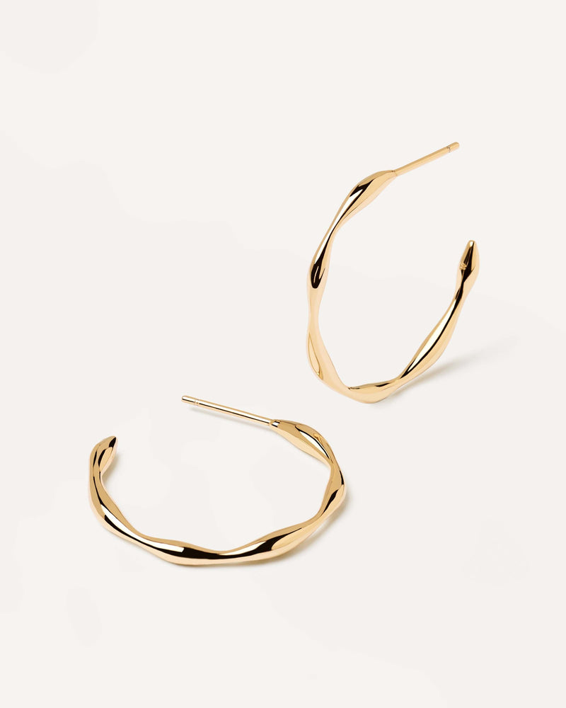 Wavy hoop earrings in gold-plated silver