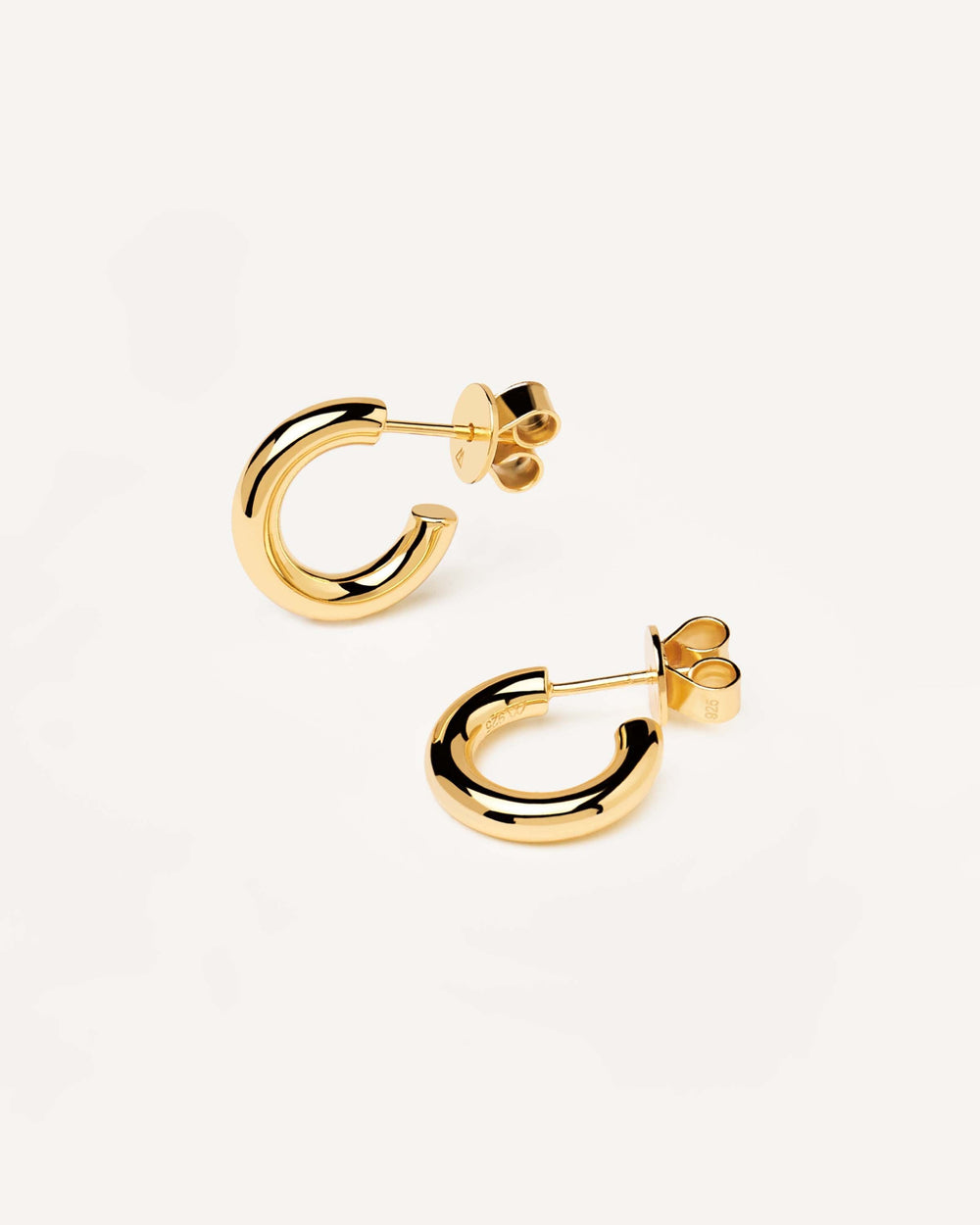 Huggie c-hoop earrings in 18k gold plated sterling silver with a b ...