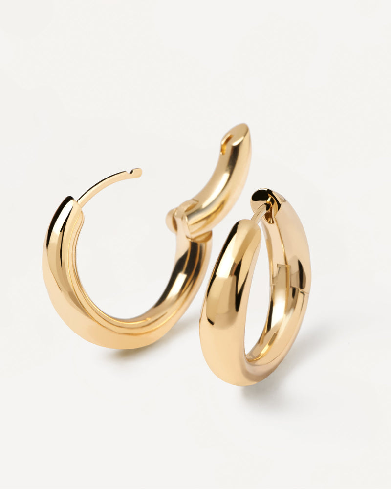 Gold-plated silver hoops with bold and curvy design | Pirouette ...