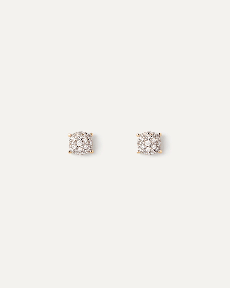 Minimalist round stud earrings in solid yellow gold set with a pavé lab-grown diamond