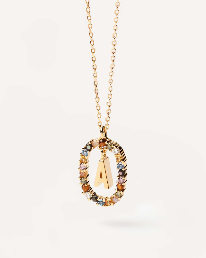 Initial A necklace in gold-plated silver, circled by colorful gemstones