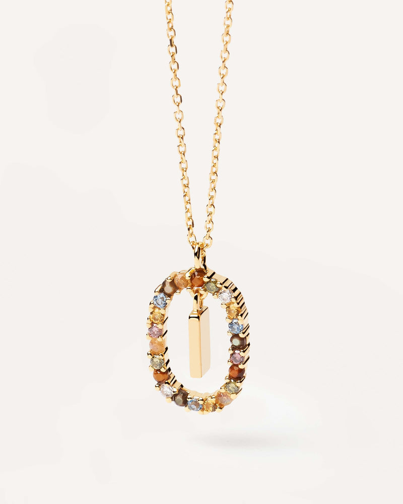 Initial I necklace in gold-plated silver, circled by colorful gemstones