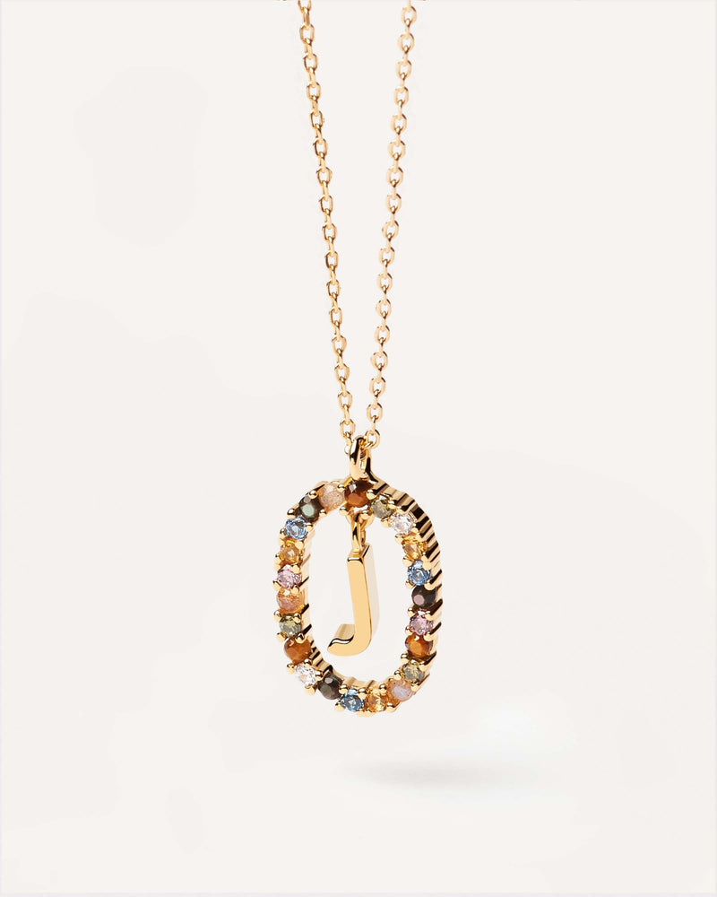 Initial J necklace in gold-plated silver, circled by colorful gemstones