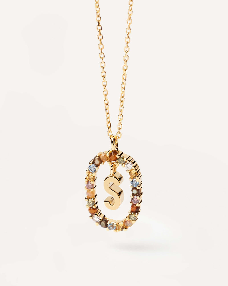 Initial S necklace in gold-plated silver, circled by colorful gemstones