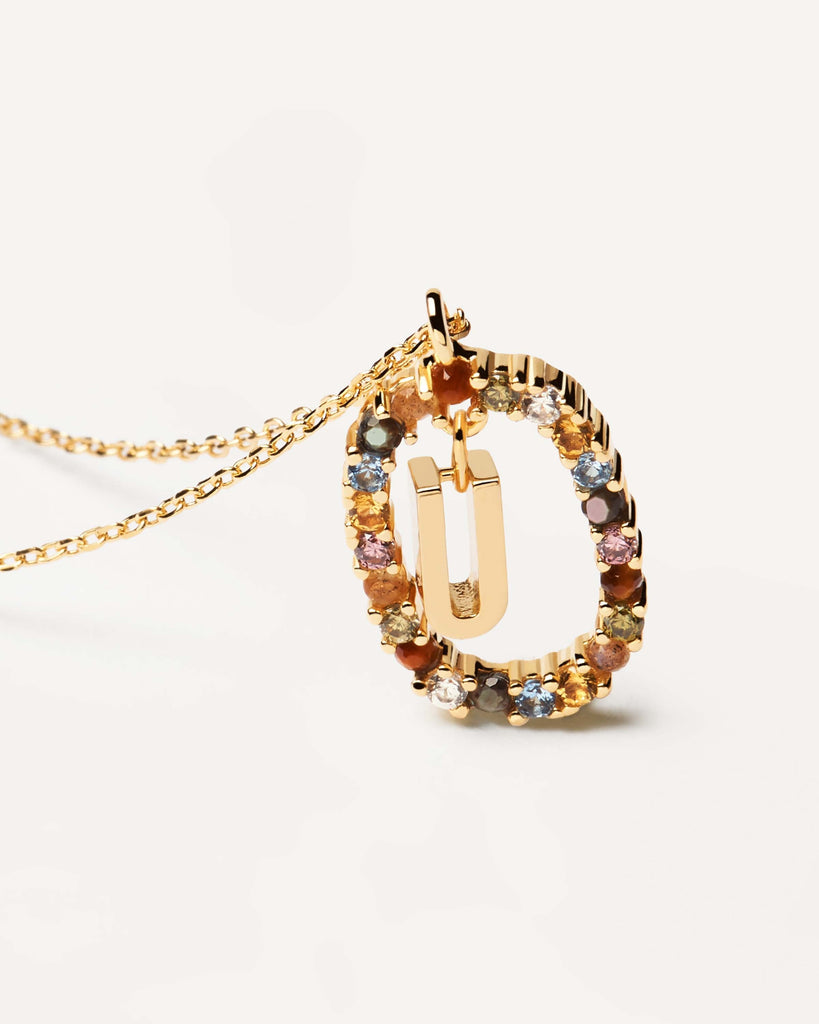 Initial U necklace in gold-plated silver, circled by colorful gemst ...