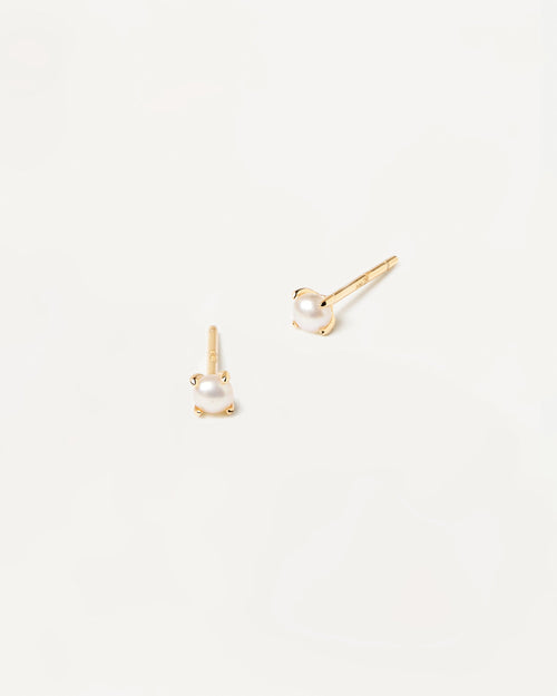 Pair of 18k gold plated single small natural pearl studs set on prongs ...