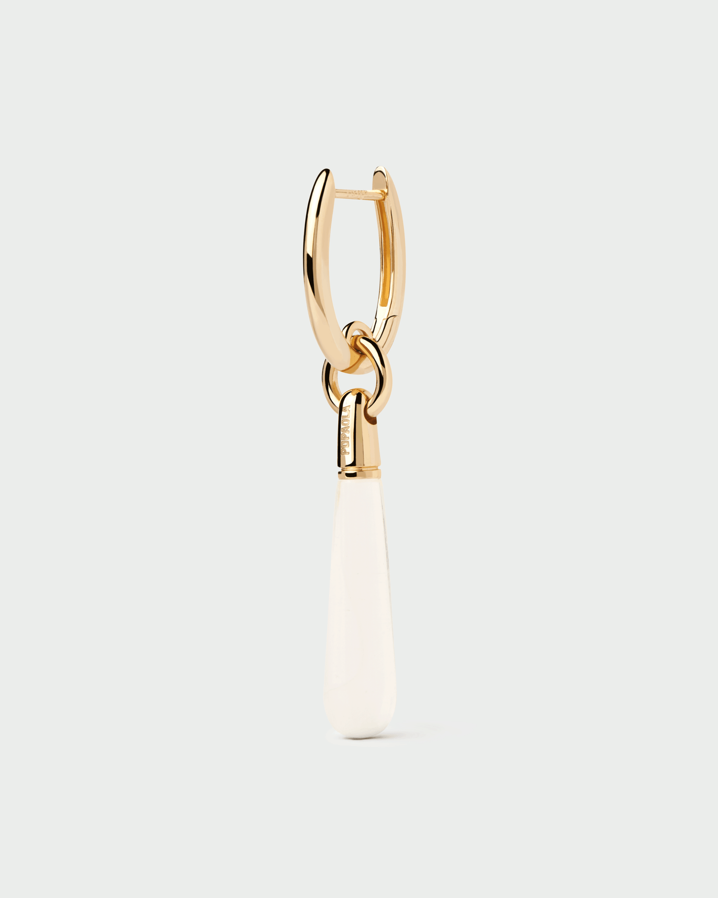 Rock crystal large Jupiter single hoop. Gold-plated single hoop with a transparent gemstone drop pendant . Get the latest arrival from PDPAOLA. Place your order safely and get this Best Seller.