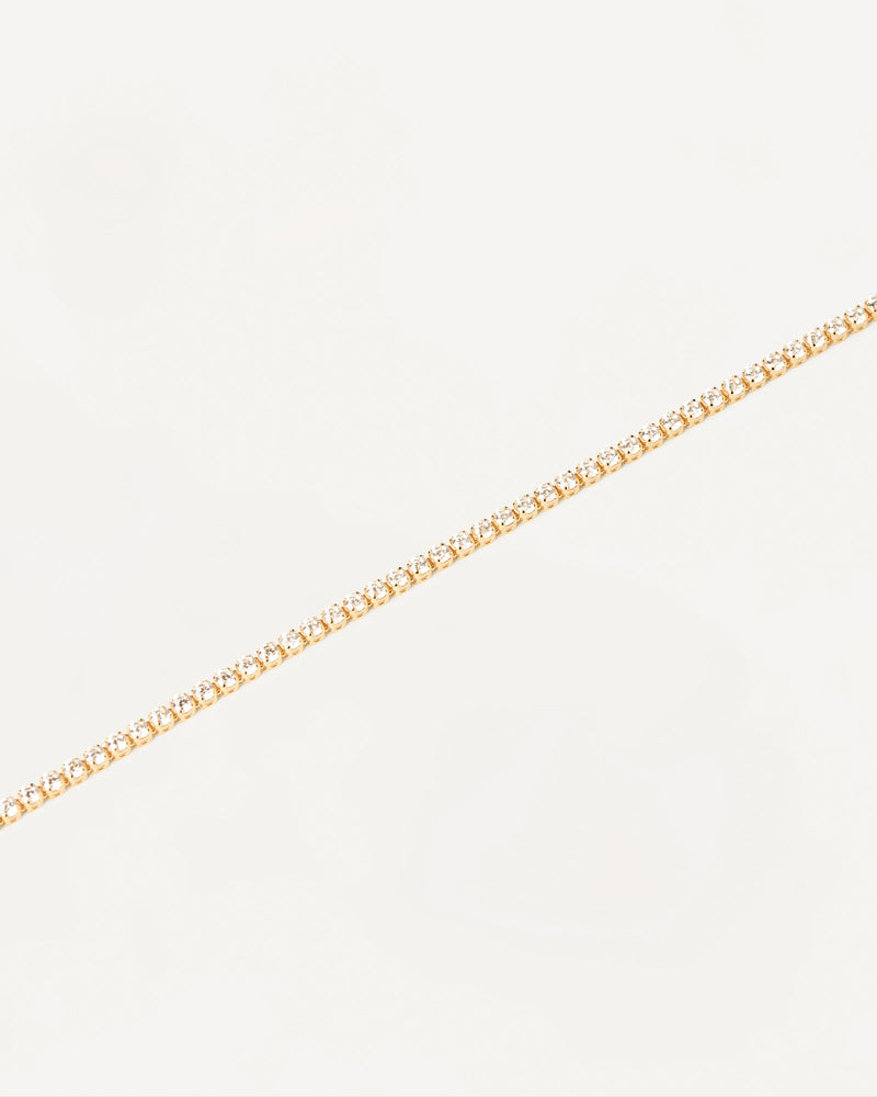 Diamonds and Gold Tennis Bracelet - 
  
    18K Gold
  
